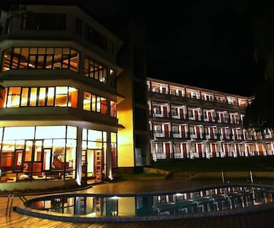 https://imgcld.yatra.com/ytimages/image/upload/t_hotel_yatra_city_desktop/v1432006086/Domestic Hotels/Hotels_Port Blair/Hotel Sentinel (Group of Singhotel)/Night_Overview.jpg